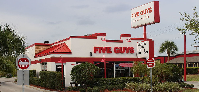 American burger chain Five Guys seeks 20 stores in Australia as family business signs on as master franchisee